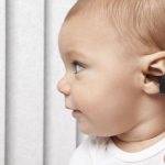 хруст в ухе при глотании