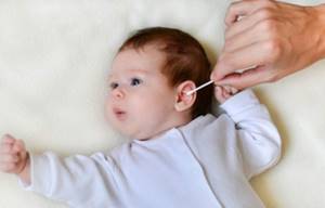 Серная пробка в ухе ребенка: причины и лечение